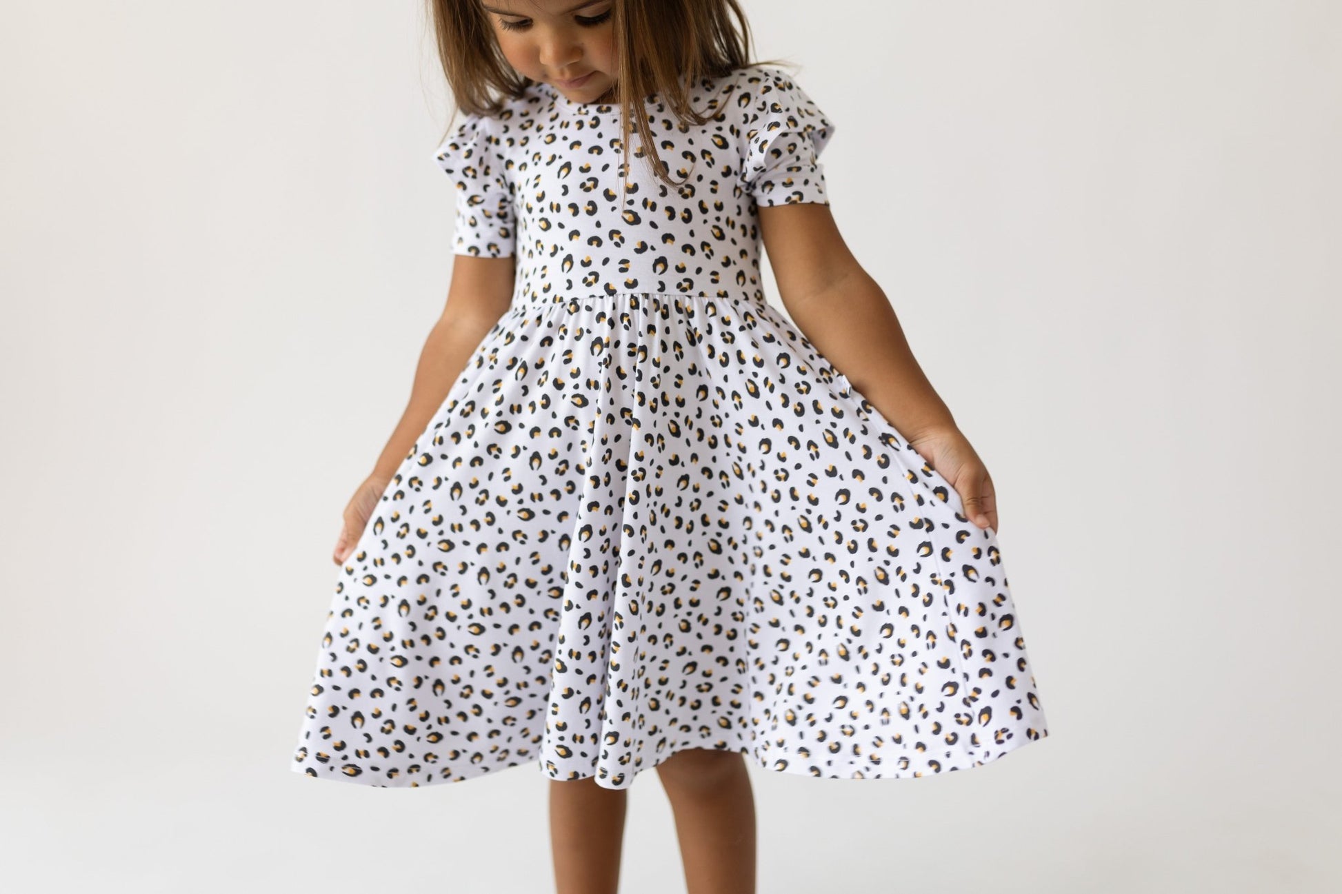 Allie Leopard Bamboo Ruffle Spin Dress - Mack & Harvie