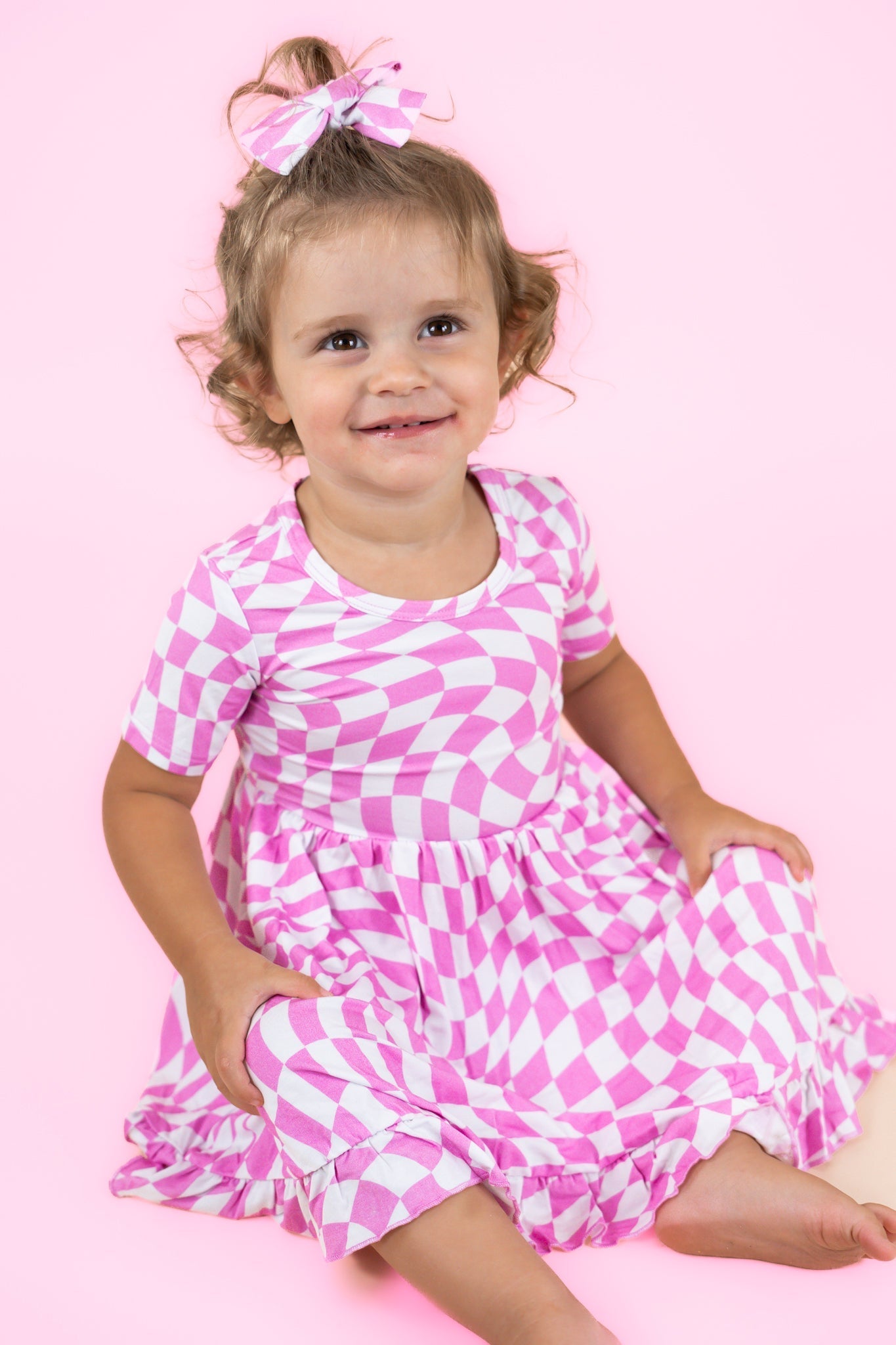 BUBBLEGUM WAVY CHECKERS DREAM RUFFLE DRESS - Mack & Harvie