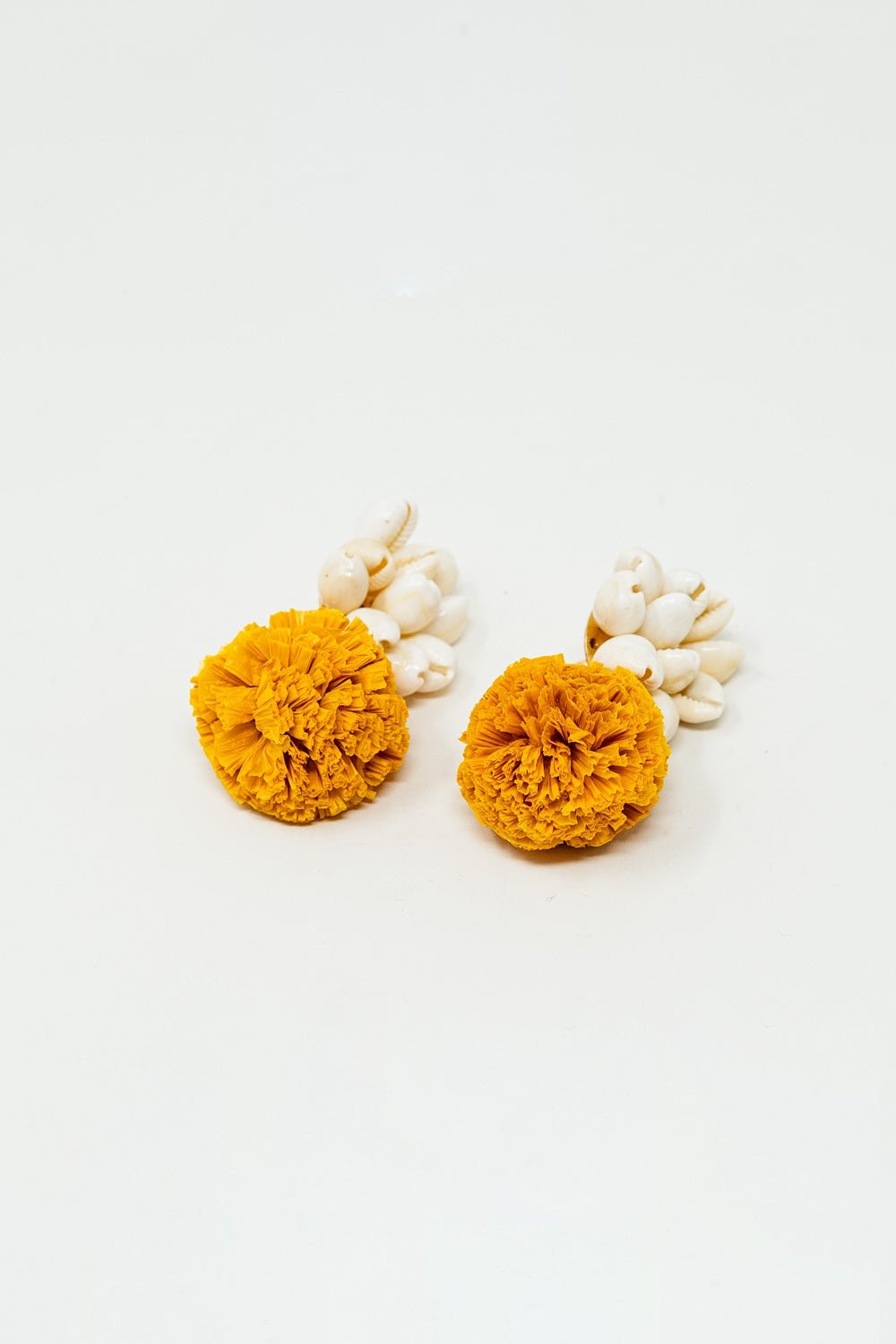 Earrings With Cream Seashells and Yellow Pom Poms - Mack & Harvie