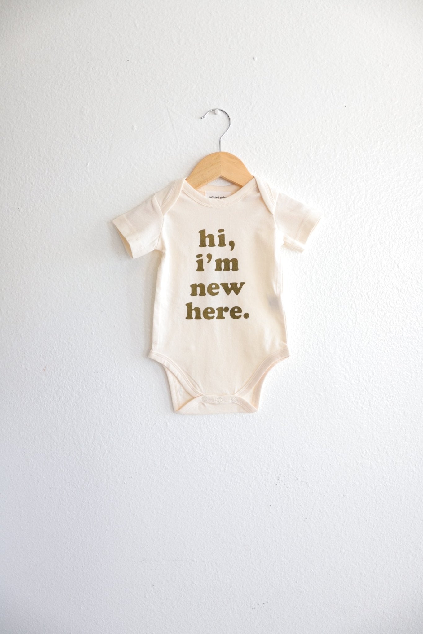 Hi, I’m New Here Baby Onesie in Fir Green - Mack & Harvie